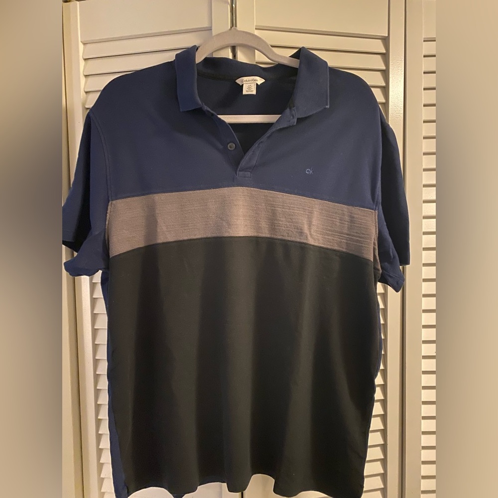 Men Calvin Klein polo shirt , navy blue and grey color size L